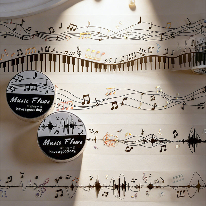 The Music Flow Series Laser Silver PET Tape featuring silver, and music designs for journaling, scrapbooking and collage