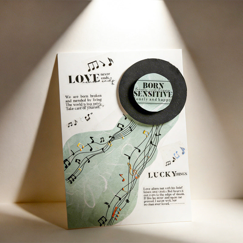 The Music Flow Series Laser Silver PET Tape featuring silver, and music designs for journaling, scrapbooking and collage