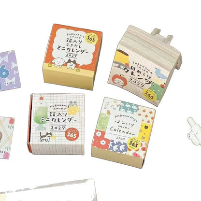 2027 Cute Illustration mini calendar featuring cute cat, dog, apple, and color grid designs for journaling, scrapbooking and collage
