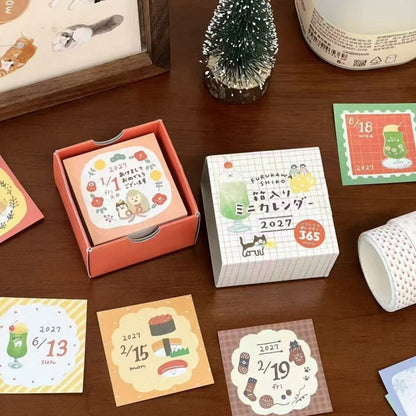 2027 Cute Illustration mini calendar featuring cute cat, dog, apple, and color grid designs for journaling, scrapbooking and collage